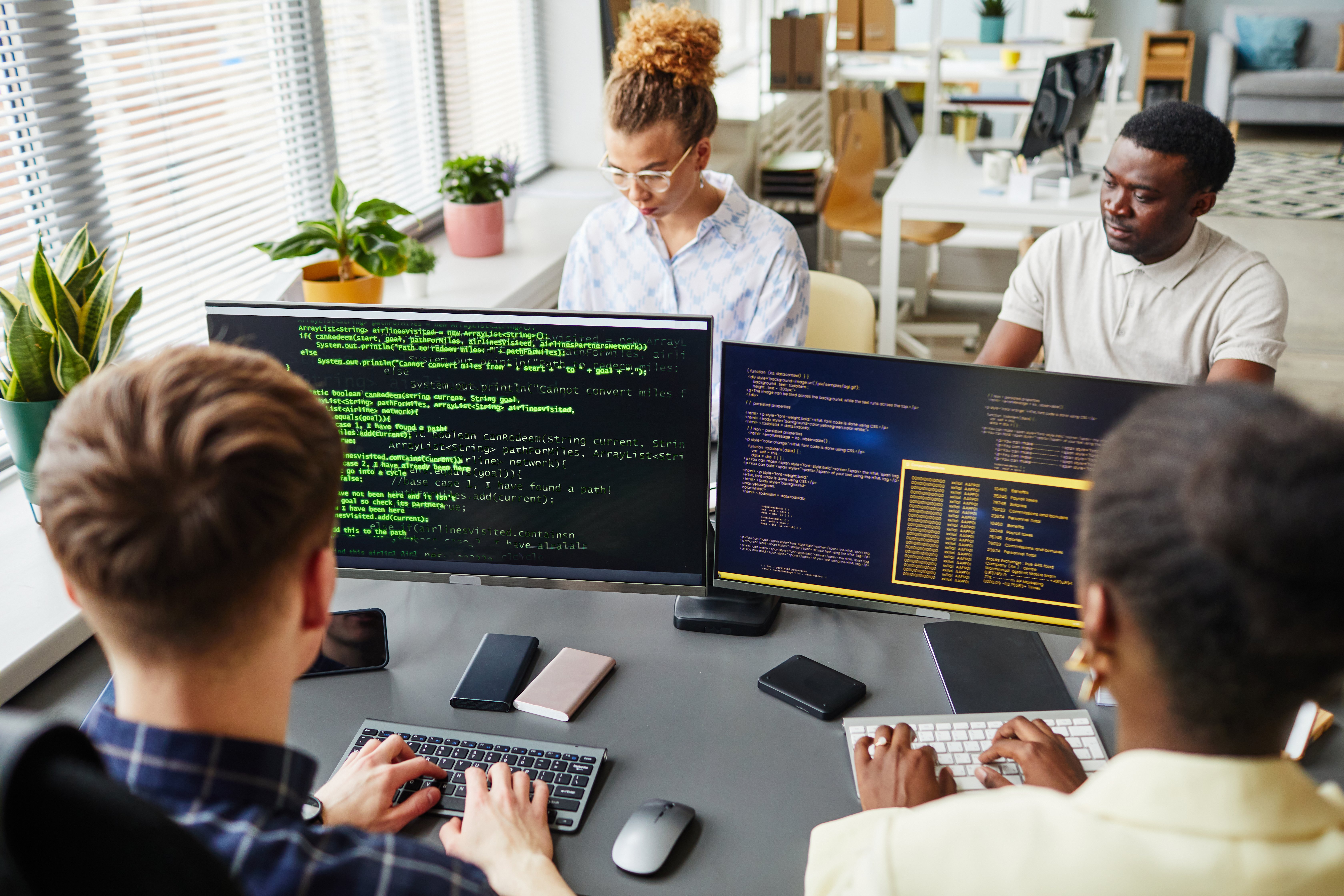 collaborative-team-working-with-code-in-modern-off-2026-09-22-00-23-57-utc