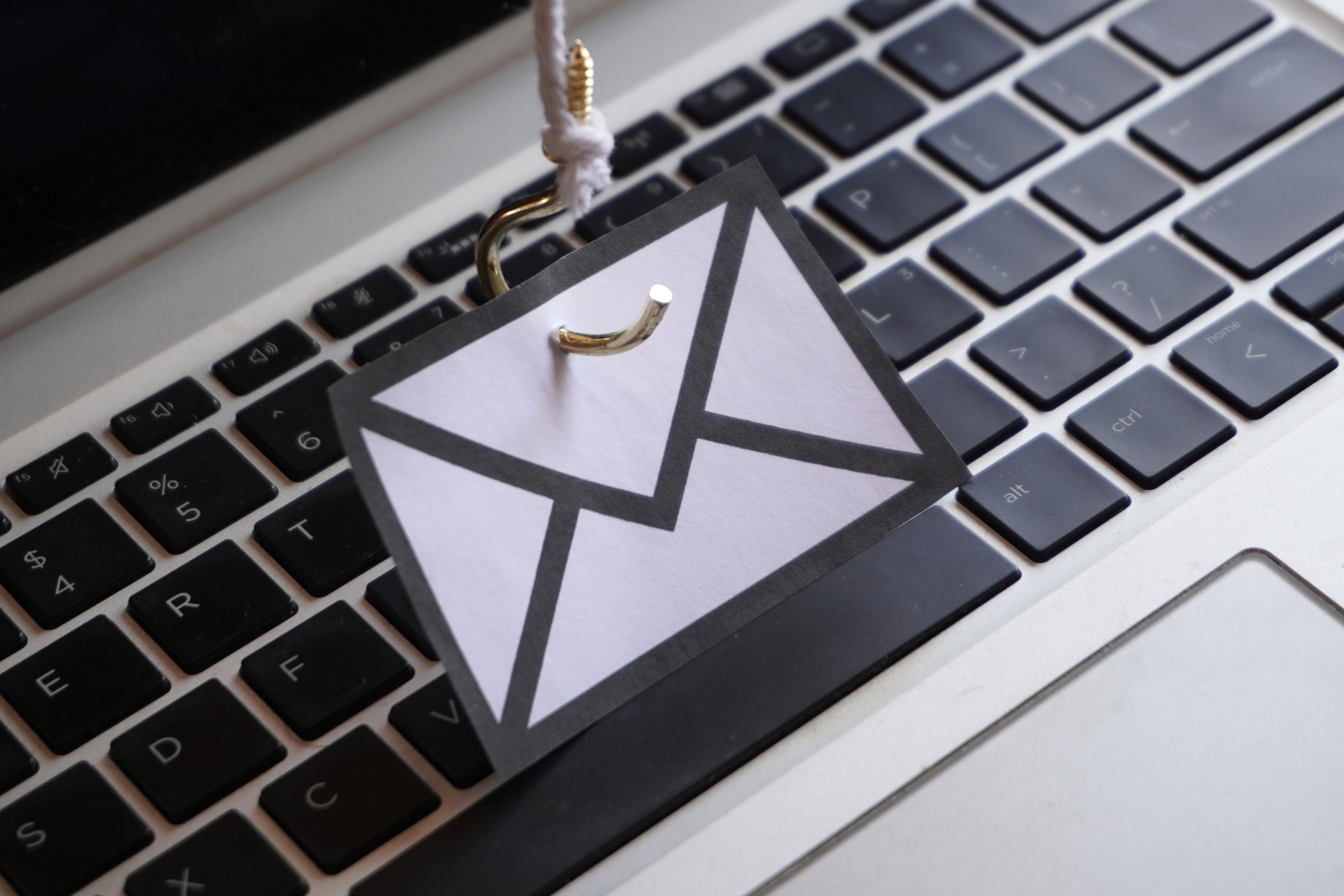 email-envelope-on-a-fishing-hook-on-laptop-2026-03-24-08-02-57-utc