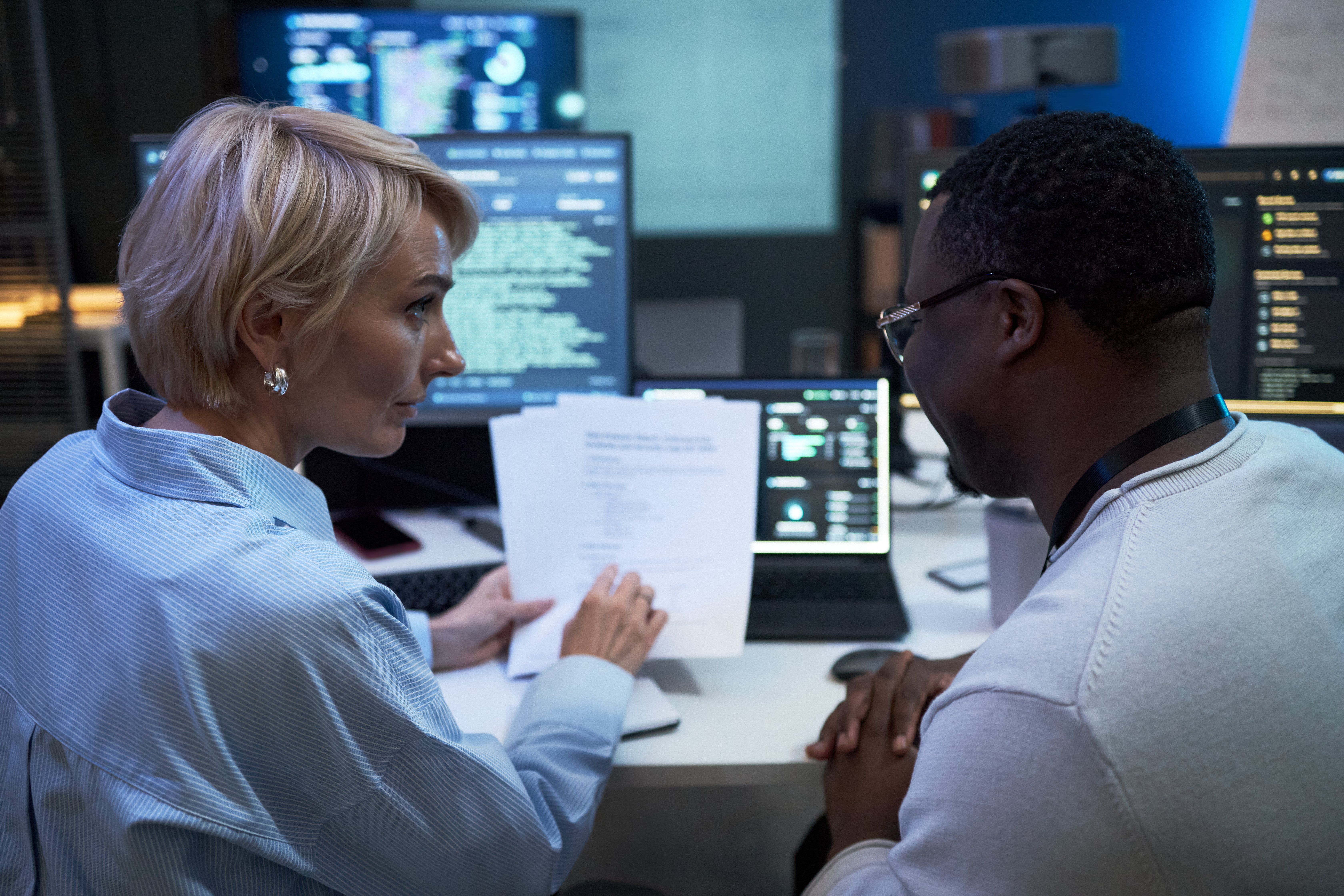 woman-and-man-collaborating-on-data-in-a-high-tech-2026-07-23-19-19-23-utc